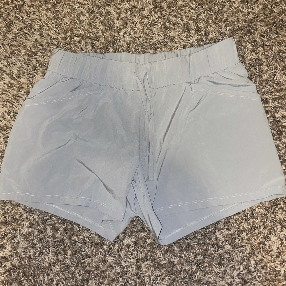 Grey athletic shorts with pockets + zipper pocket